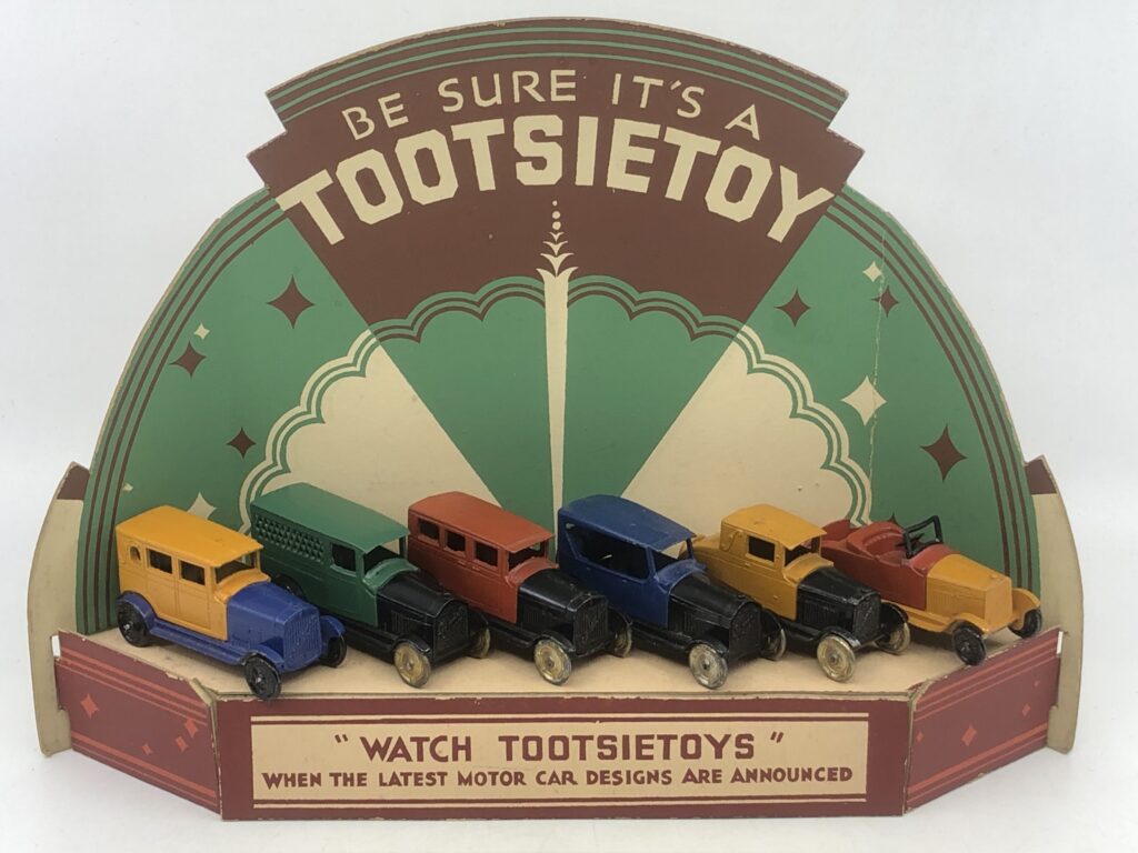 TOOTSIETOY GM and Ford Woody and display